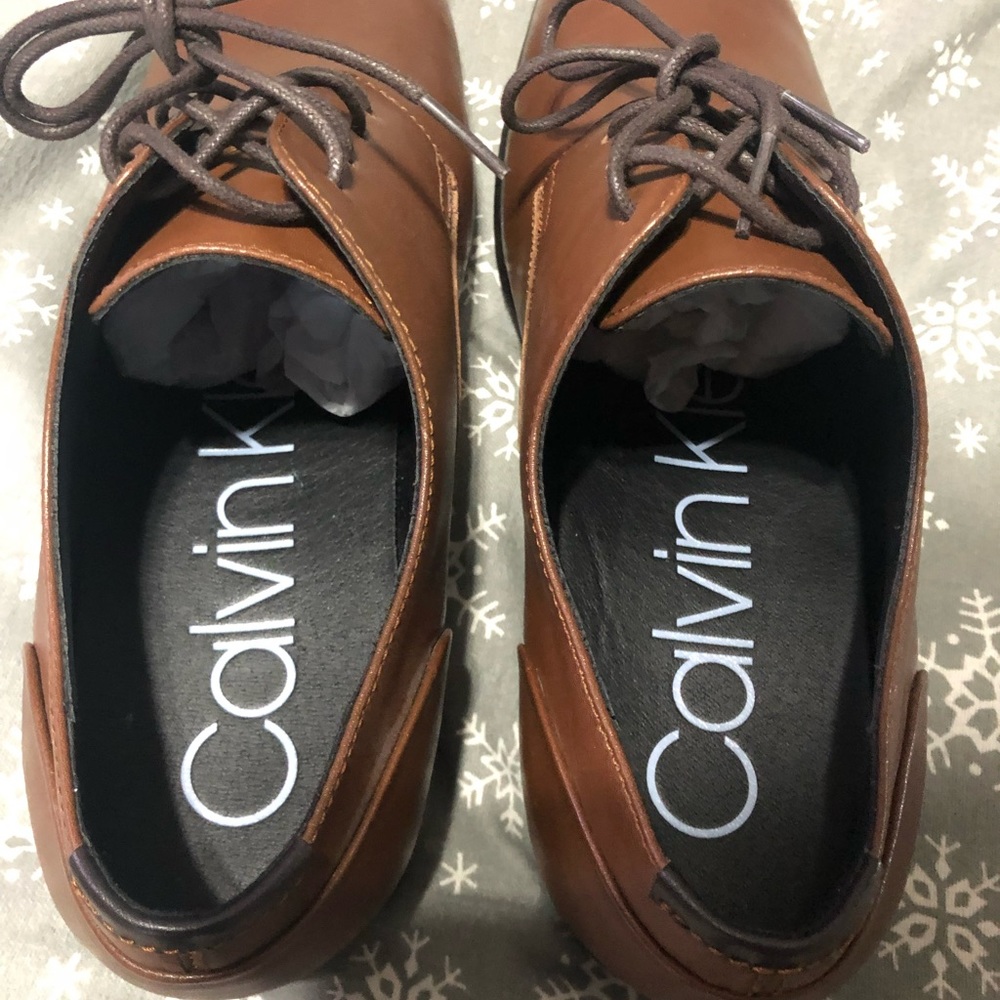 Brand New Calvin Klein shoes sz 10.5. Does not come with original box